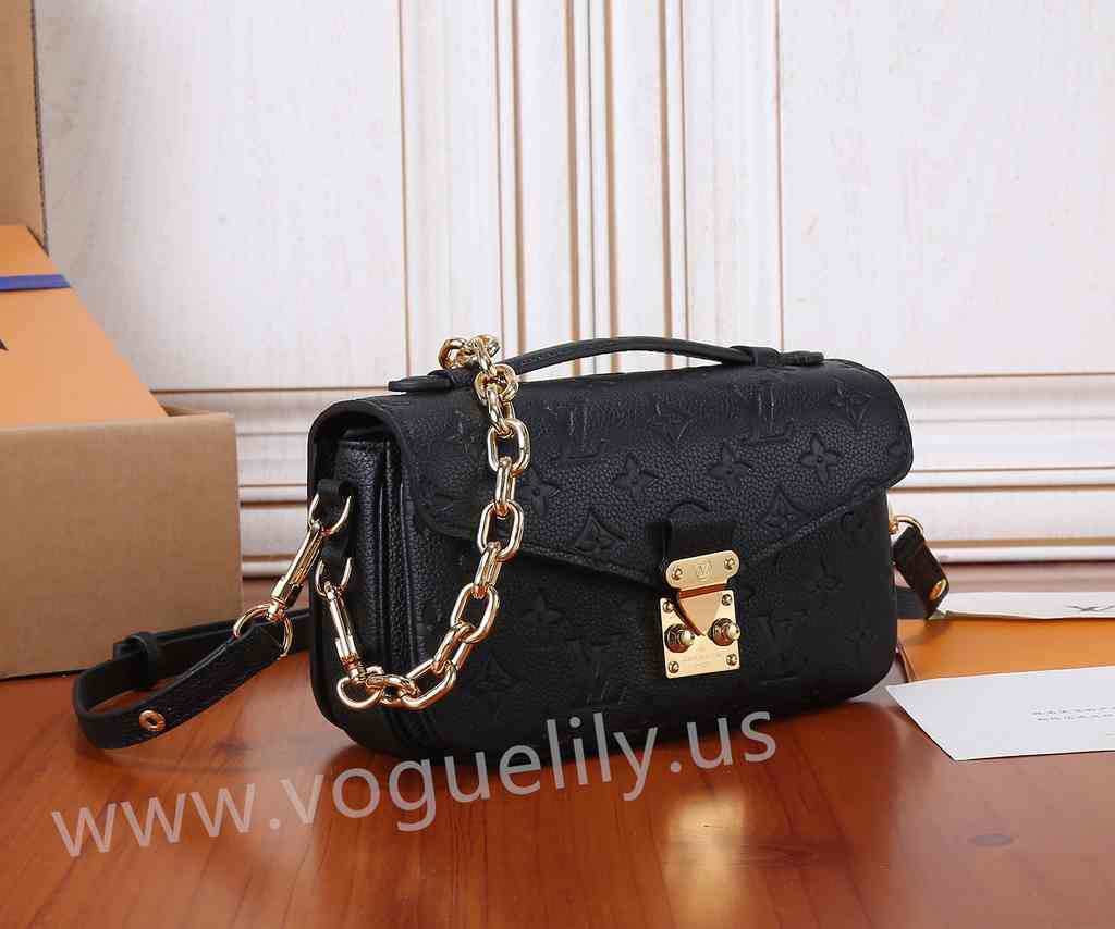 M46595 Pochette Métis East West 21 M46595 Pochette Métis East West 21