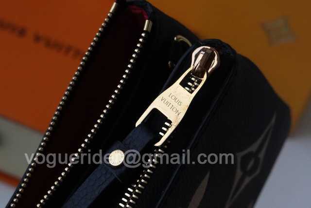 M69203 Double Zip Pochette 20 M69203 Double Zip Pochette 20